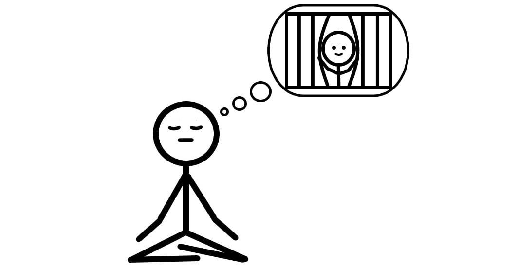 A person meditating and visualizing breaking out of prison